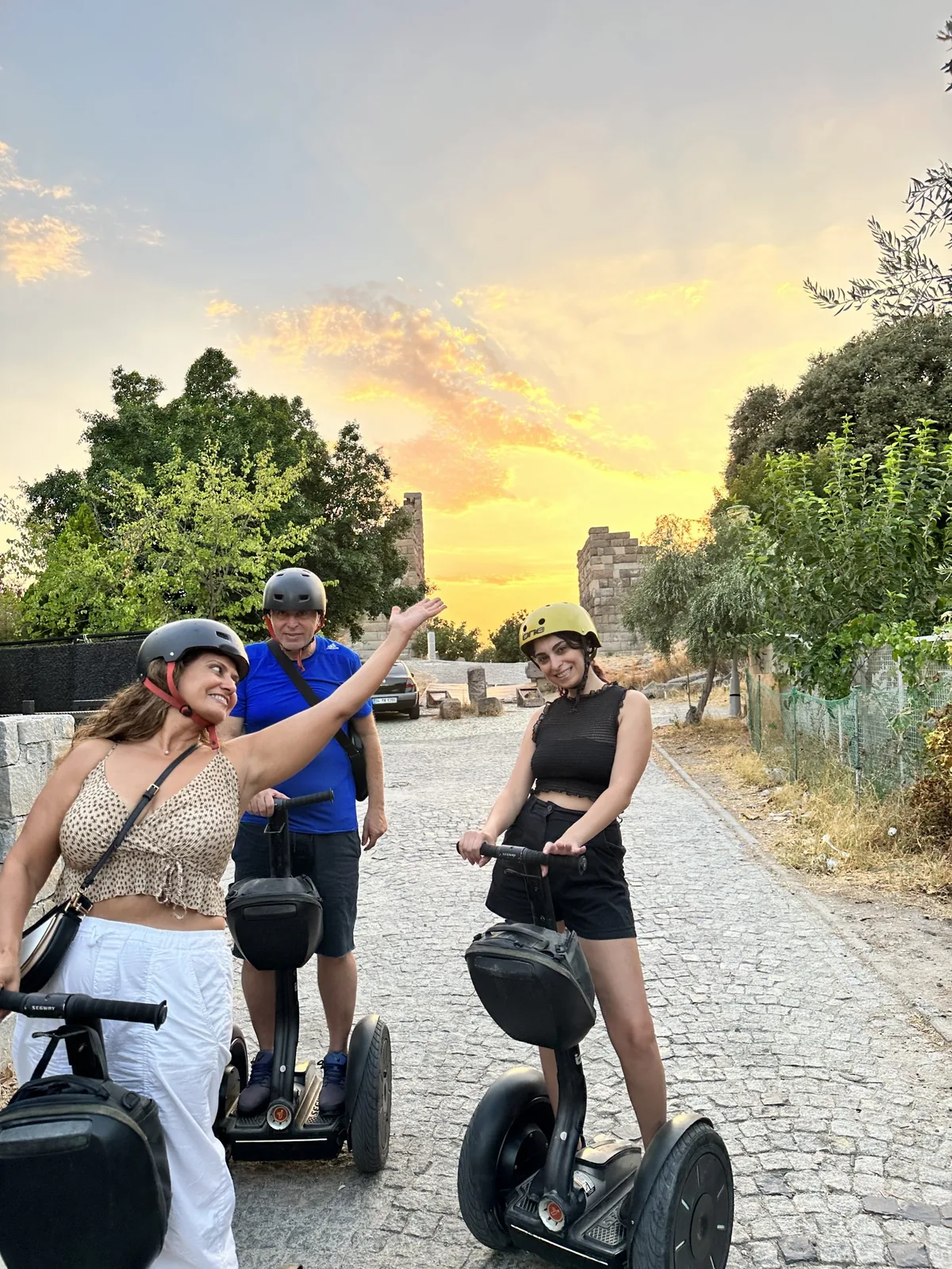 Segway group at sunset in front of ancient ruins